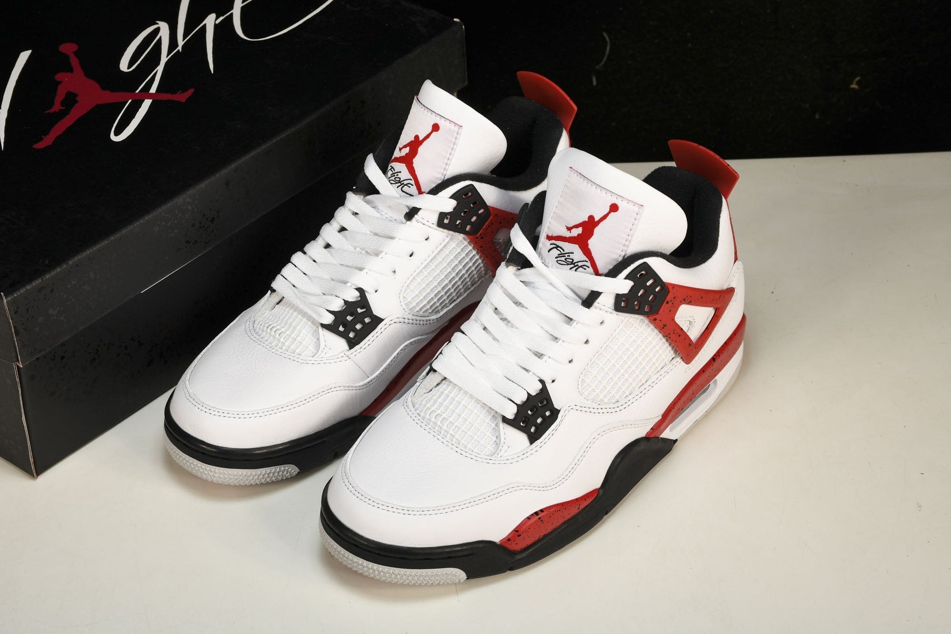 Iconic Air Jordan 4 Retro Red Cement Sneakers: Classic Style, Supreme Comfort