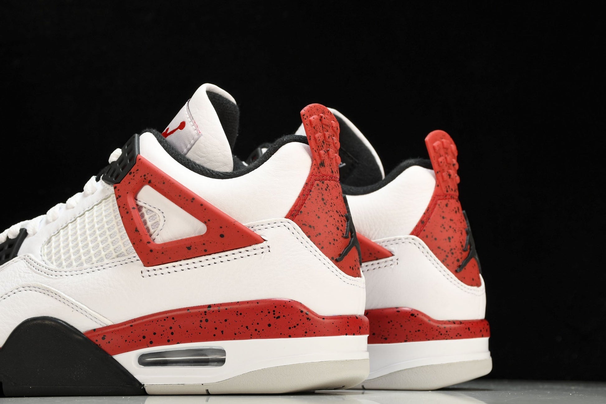Iconic Air Jordan 4 Retro Red Cement Sneakers: Classic Style, Supreme Comfort